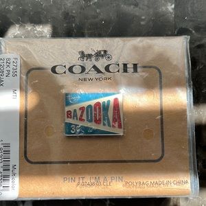 Coach Bazooka Pin